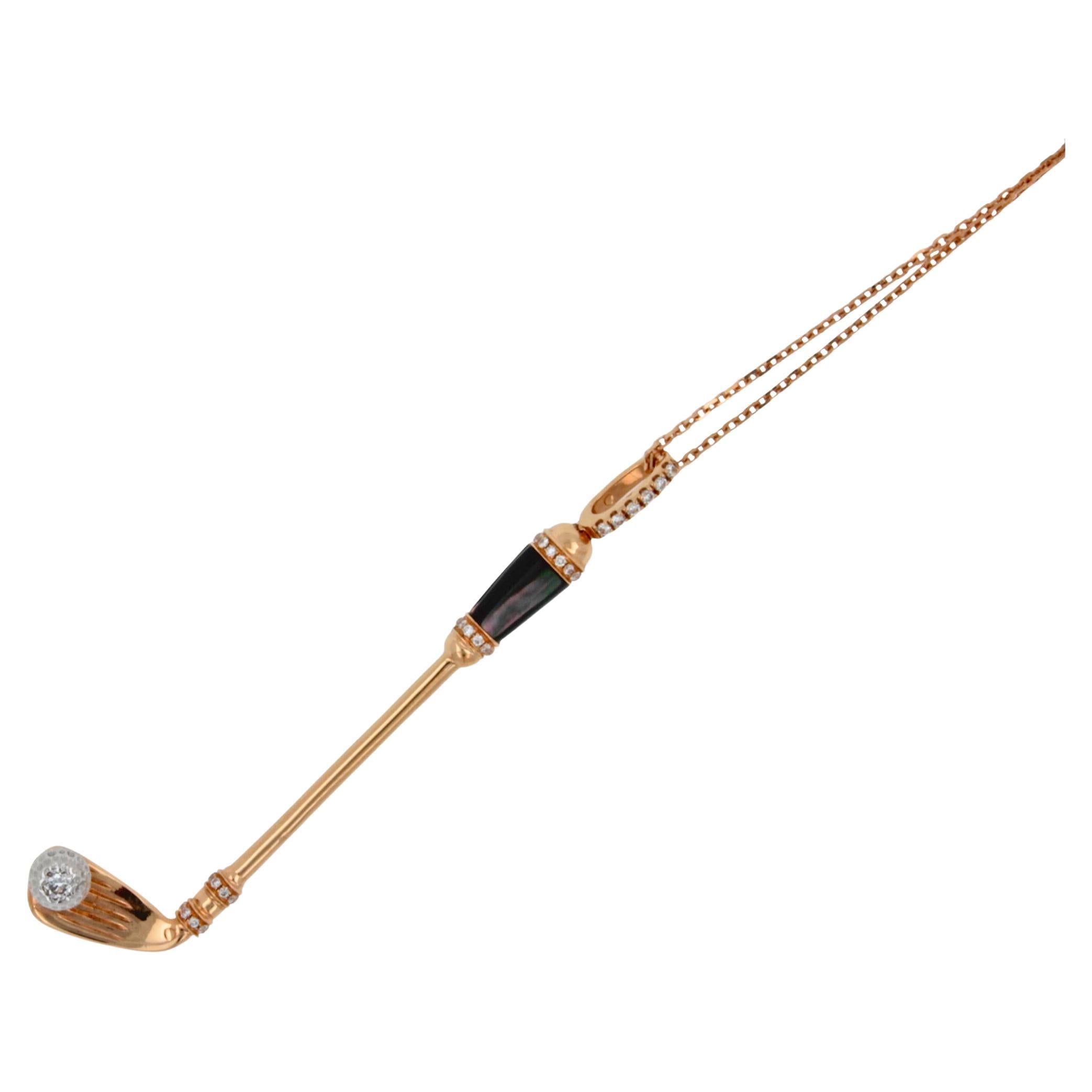 18K Rose Gold
Grey Black Mother of Pearl Gemstone Handle
White Diamond Golf Ball Gemstone
0.30 cts Diamonds
16-18 inches Diamond-Cut Link Cable chain length
In-Stock
This is part of Galt & Bro. Jewelry's exclusive, custom made-to-order Golf Club
