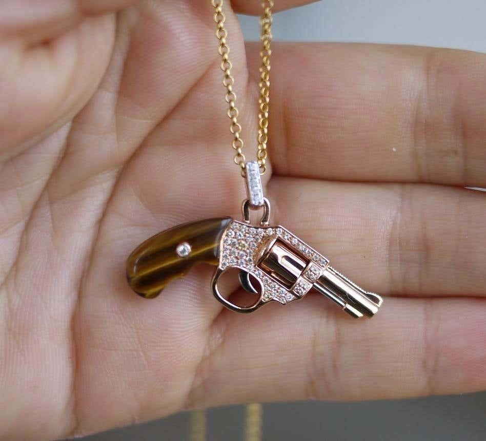 Mixed Cut Diamond Gun Revolver Black Onyx Gem 18 Karat Rose Gold Necklace Pendant Charm  For Sale