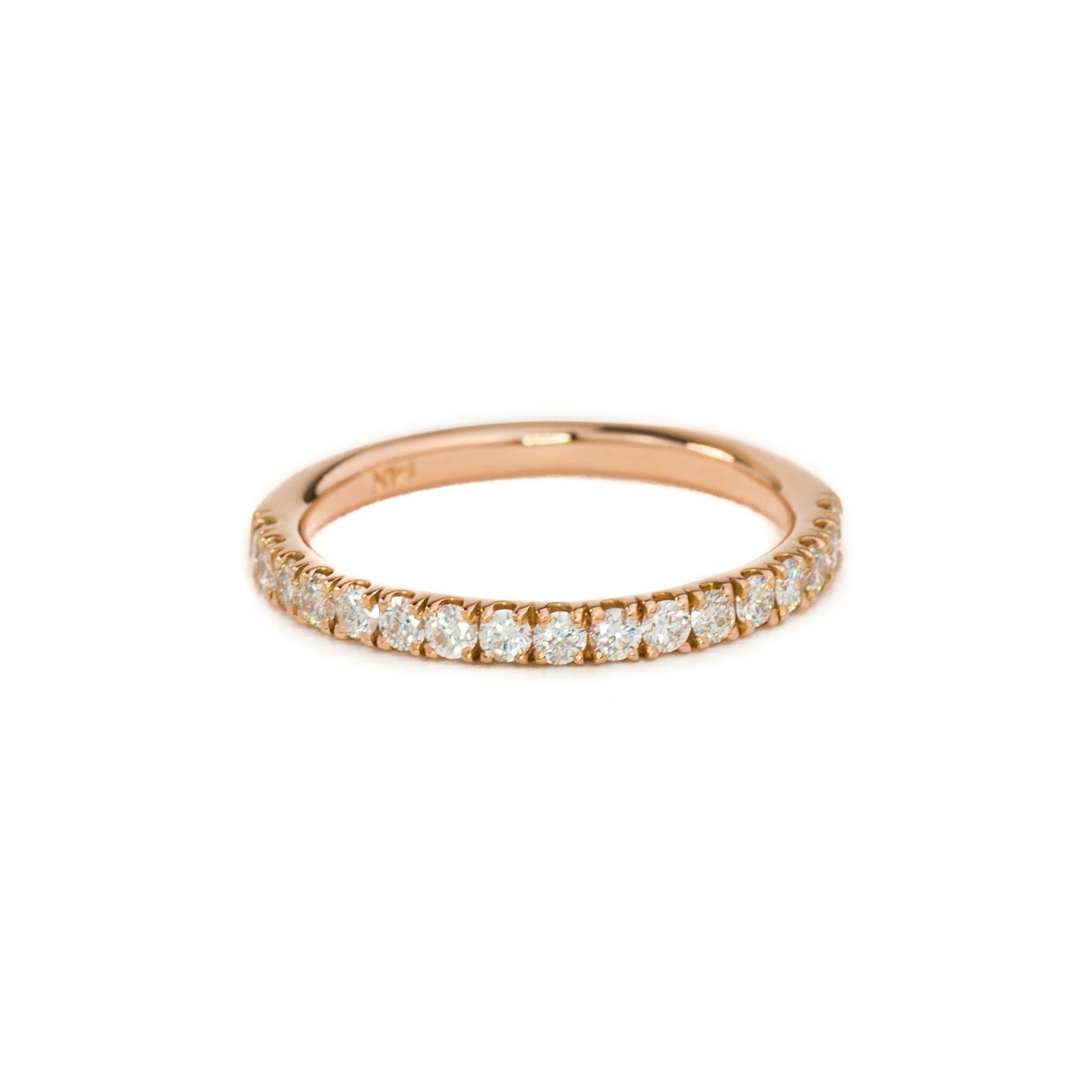 This dainty diamond half eternity band is perfect as a wedding band, wearing alone or stacking. This band will match with many of the engagement rings.

This is a custom made to order ring. Please allow 3-4 weeks for delivery.

Your 14k gold color