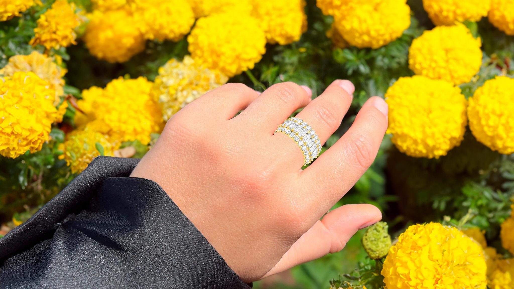 It comes with the Gemological Appraisal by GIA GG/AJP
All Gemstones are Natural
48 Diamonds = 5.28 Carats
Cut: Emerald, Round
Metal: 18K Yellow Gold
Ring Size: 6.5* US
*It can be resized complimentary