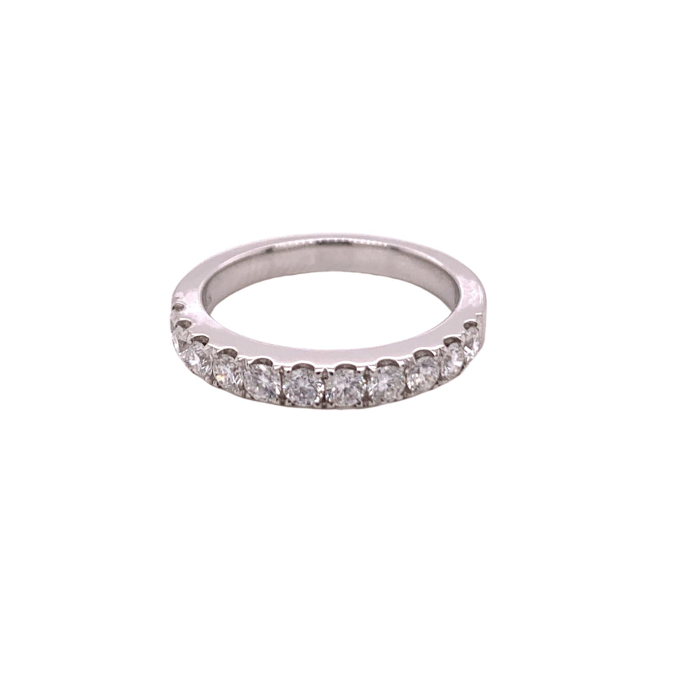 Half Eternity Diamond Ring made with real/natural diamonds. Total Diamond Weight: 0.60 carats. Diamond Quantity: 11 brilliant cut diamonds. Color: G. Clarity: VS. Mounted on 18 karat white gold. Size #6. 
