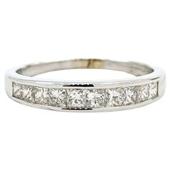 Anello a mezza eternità con diamante in oro bianco 14 carati