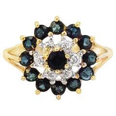 Bague halo de diamants et saphirs ronds en or jaune 14 carats