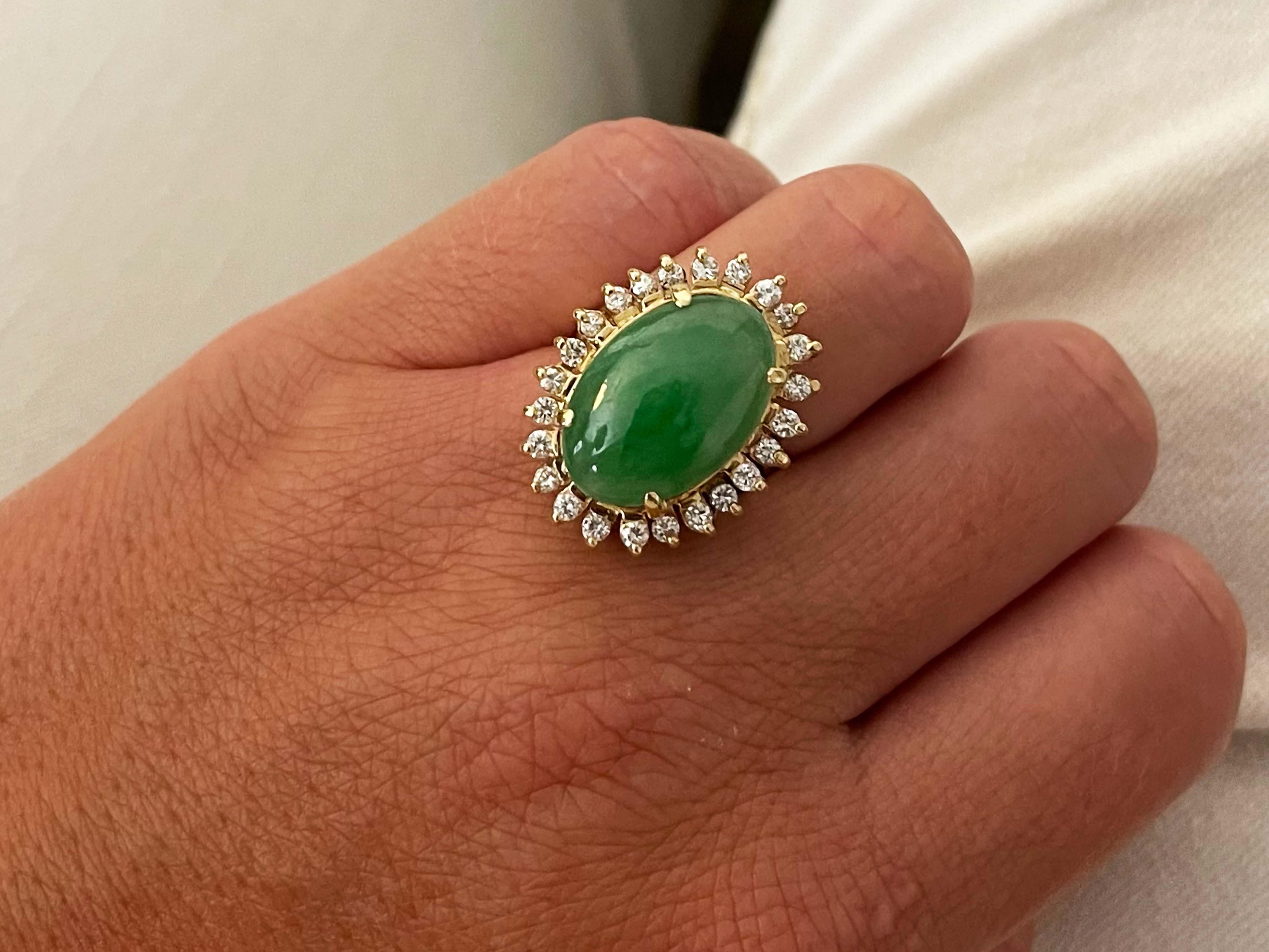 Item Specifications:

Metal: Yellow Gold 

Style: Statement Ring

Ring Size: 5.75 (resizing available for a fee)

Total Weight: 10 Grams

Gemstone Specifications:

Center Gemstone: Jadeite Jade

Shape: Oval

Color: Green

Cut: Cabochon 

Jade Carat