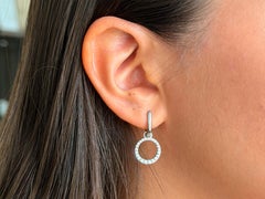 Orecchini pendenti con diamanti a corona in oro bianco 14 carati