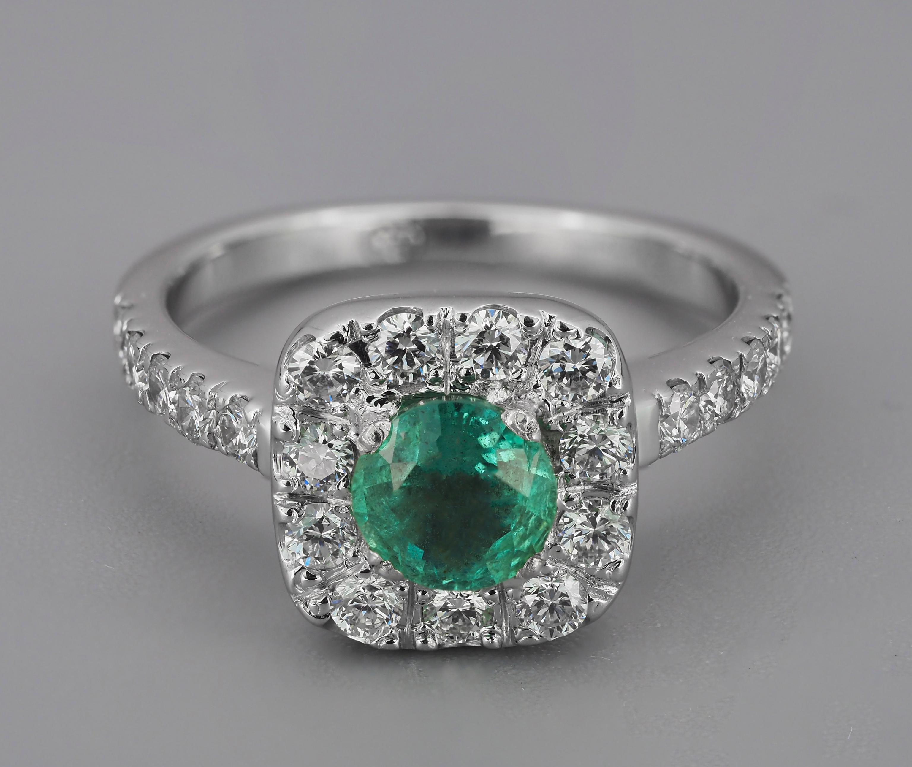 Diamond Halo emerald 14k gold ring. 
Emerald and diamonds gold ring. Vintage Emerald Ring. Emerald engagement ring. Statement gold ring.

Metal: 14k gold
Weight - 3 gr - depends from size.

Central stone: Emerald
Cut: Round
Weight: aprx 0.5