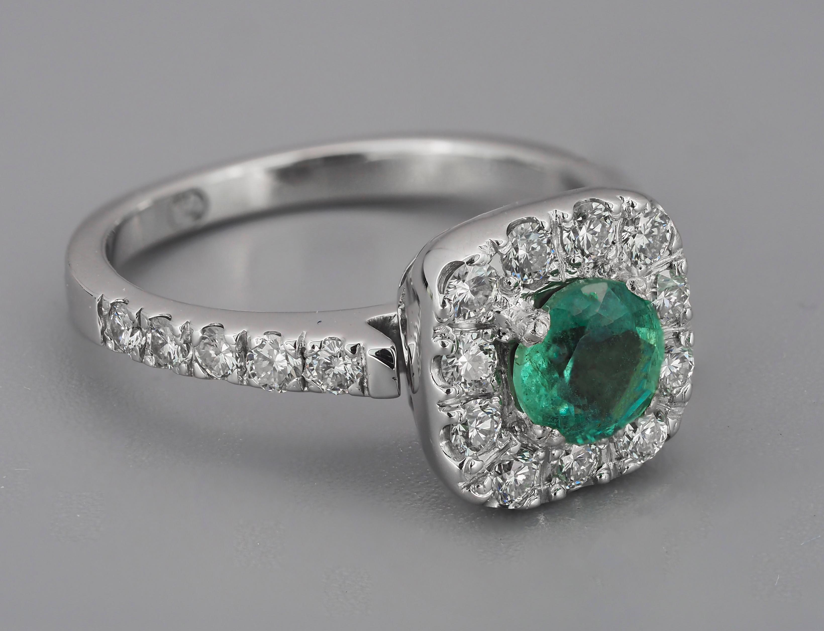 Modern Diamond Halo emerald 14k gold ring.  For Sale