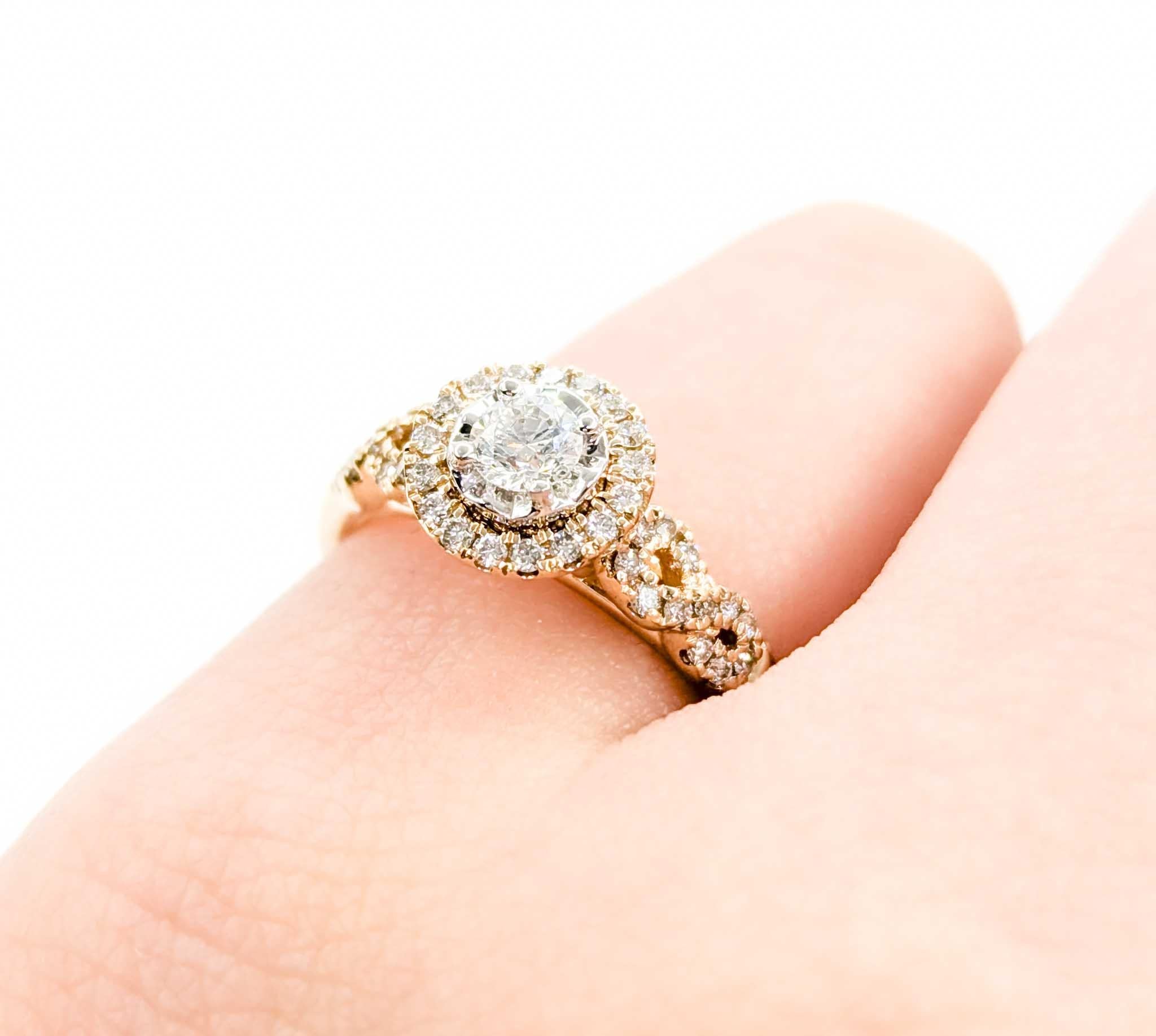 Round Cut Diamond Halo Engagement Ring in Yellow Gold For Sale