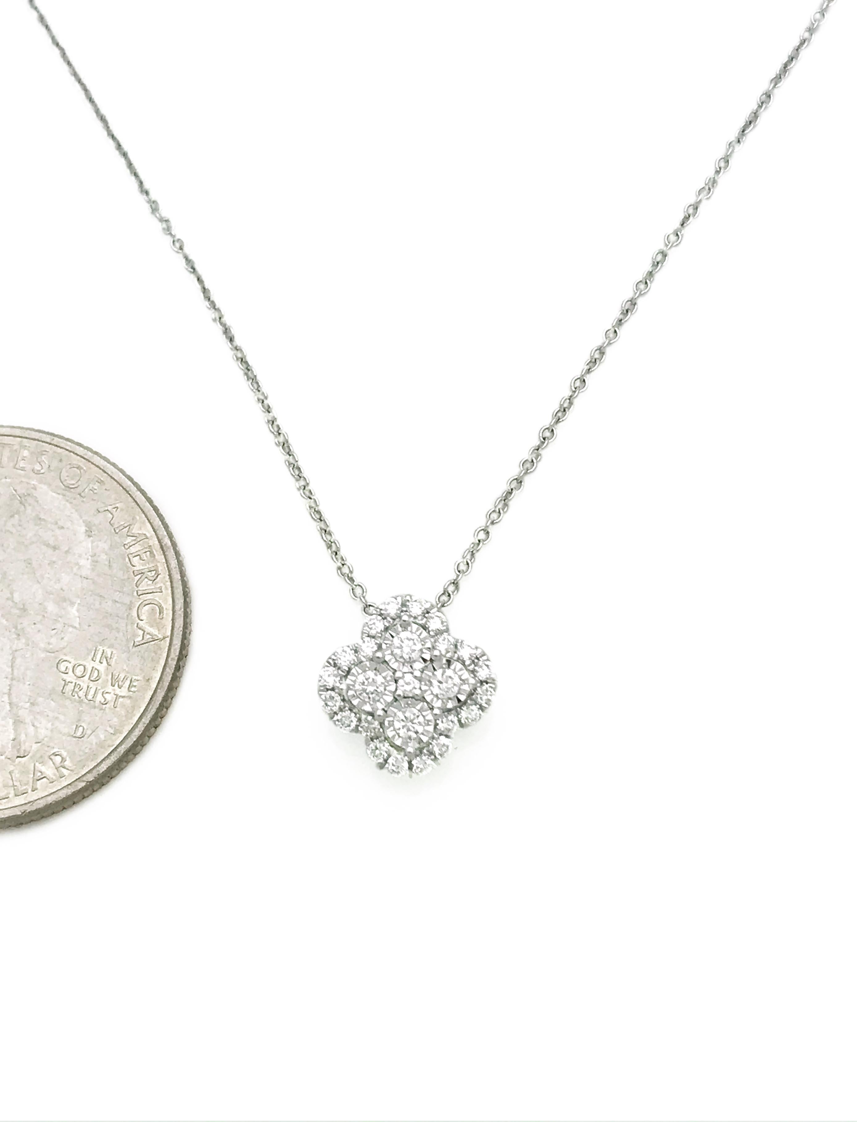 This beautiful diamond halo necklace is made of 25 round brilliant cut diamonds.

The necklace is made of entirely 14kt white gold. A high quality cable style chain supports the dainty pendant. This necklace is the perfect gift for a special