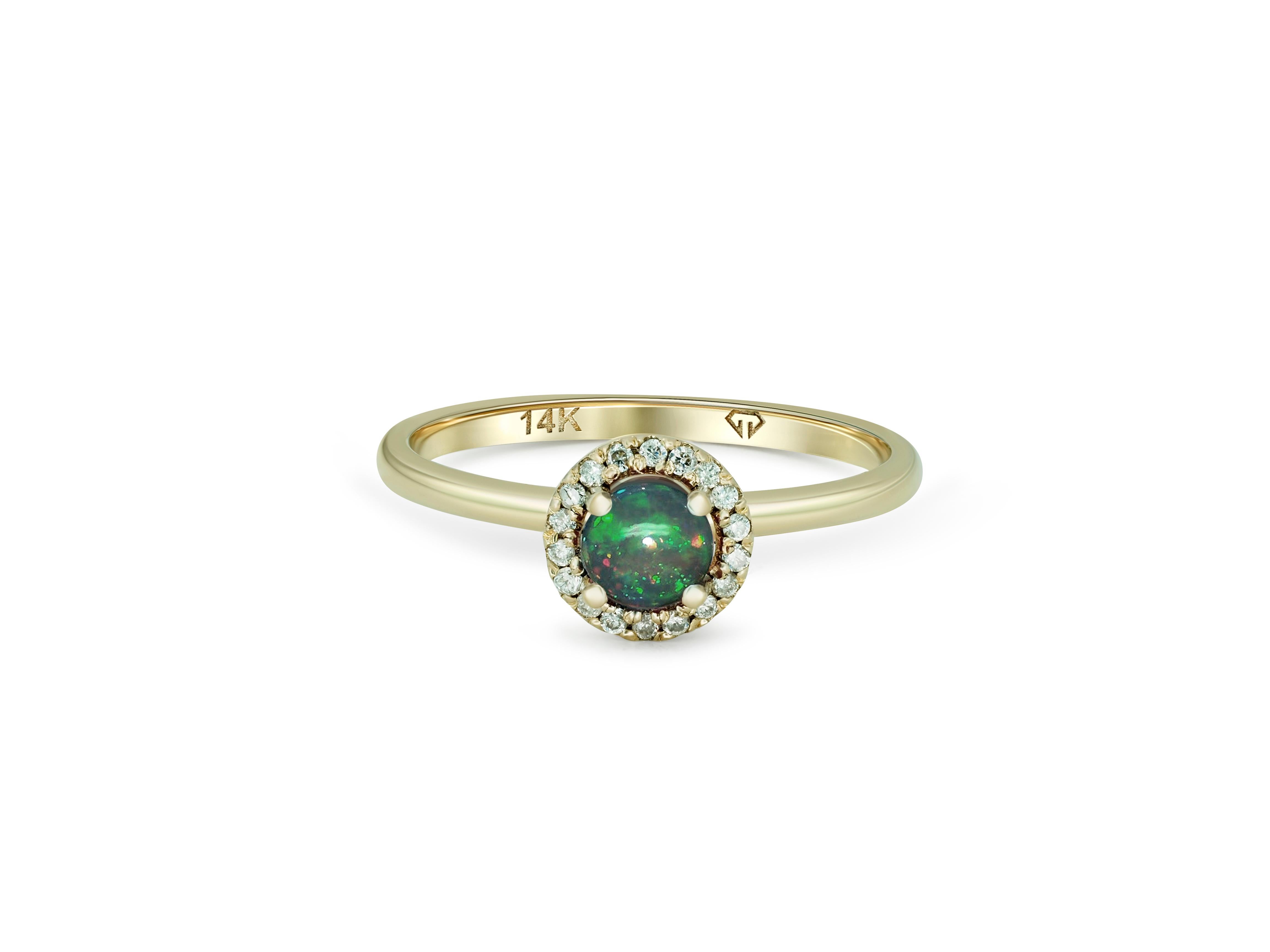 Diamond Halo Opal Ring in 14k Gold. 
Opal gold ring. Opal engagement ring. Round opal ring. Everyday opal ring. October birthstone opal ring.

Metal type: Gold
Metal stamp: 14k Gold
Weight: 2 gr - depends from size

Central gemstone:
Opal: round