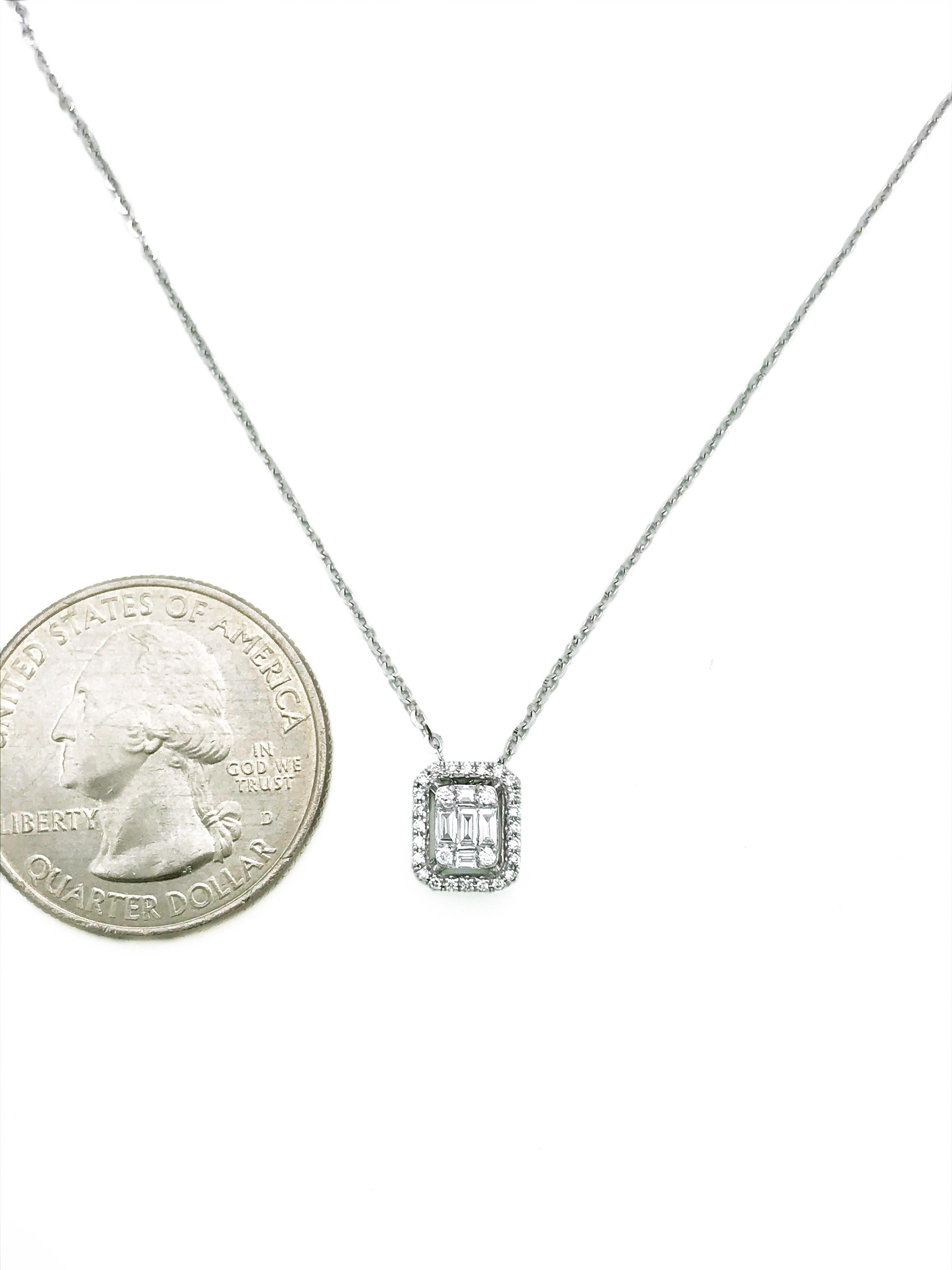 This diamond halo pendant necklace features 33 diamonds of VS2 clarity. The center of the pendant consists of round and baguette cut diamonds.

This is a one of a kind design. You will receive the necklace in the pictures.

▸ ▸ ▸ Details ◂ ◂