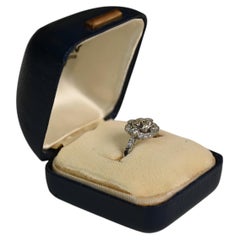 0.70 Carat Engagement Ring. Cushion Cut and Old European Halo Platinum I VS2