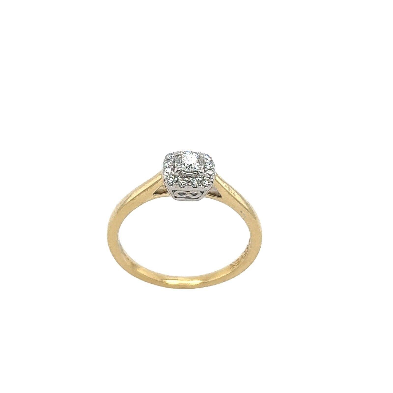 This gorgeous Diamond ring set in an 18ct Yellow & White Gold setting.  with 0.25ct natural round brilliant cut Diamonds in a halo setting. This is a unique and eye-catching ring, with inside engraving 