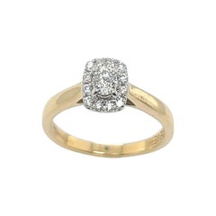 Conjunto de anillos «Halo» con diamantes de 0,25 ct en oro amarillo y blanco de 18 quilates