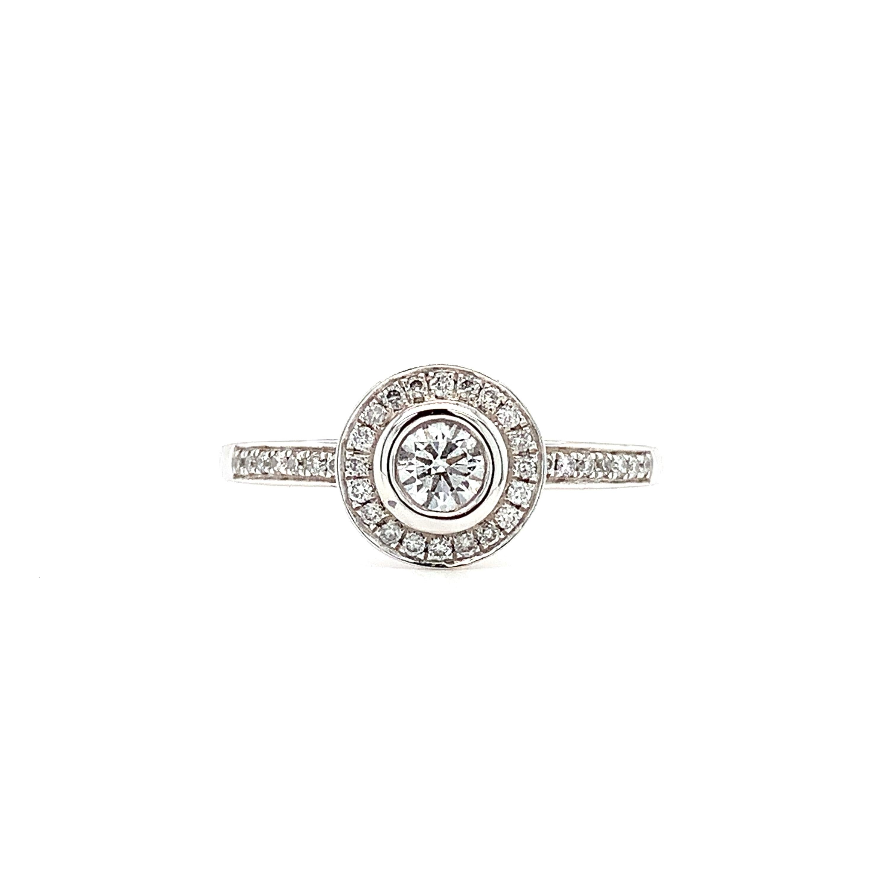 Modern Diamond Halo Solitaire Engagement Ring Platinum For Sale