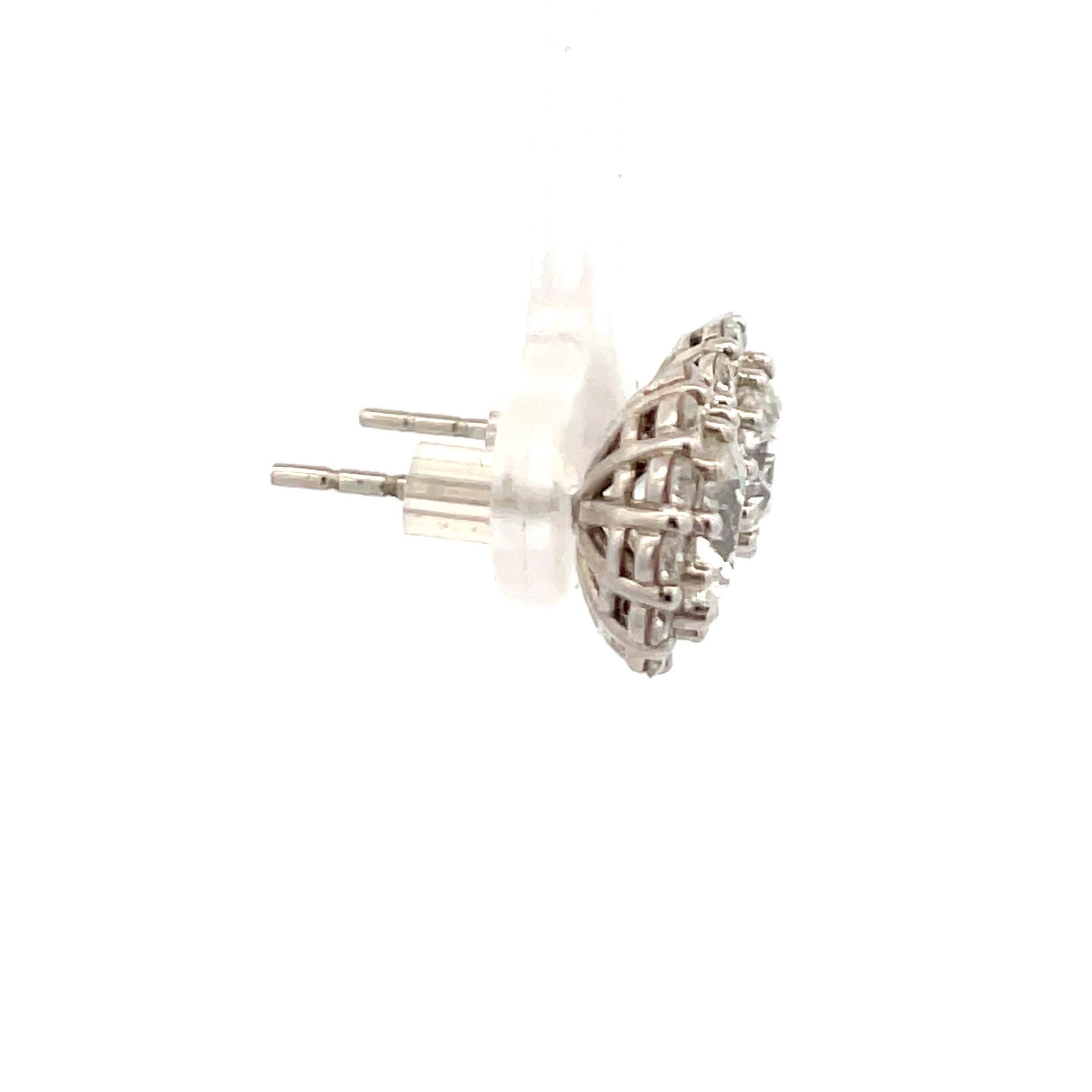 Diamond Halo Stud Earrings 3.07 Carats H SI3-I1 18 Karat White Gold In New Condition For Sale In New York, NY