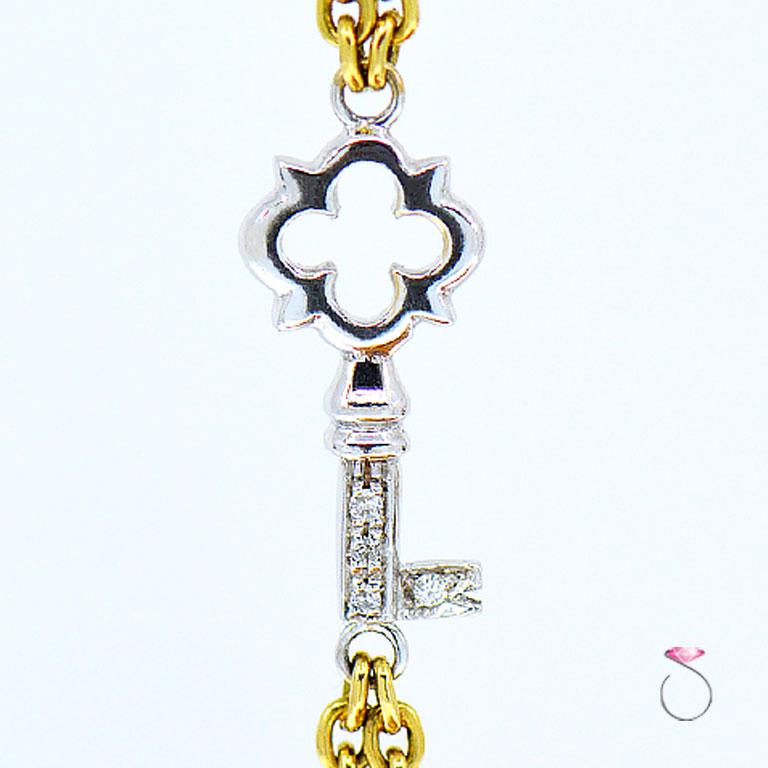 Round Cut Diamond Heart and Key Designer Bracelet in 18 Karat Yellow and White Gold