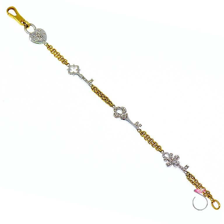 Diamond Heart and Key Designer Bracelet in 18 Karat Yellow and White Gold In New Condition In Honolulu, HI