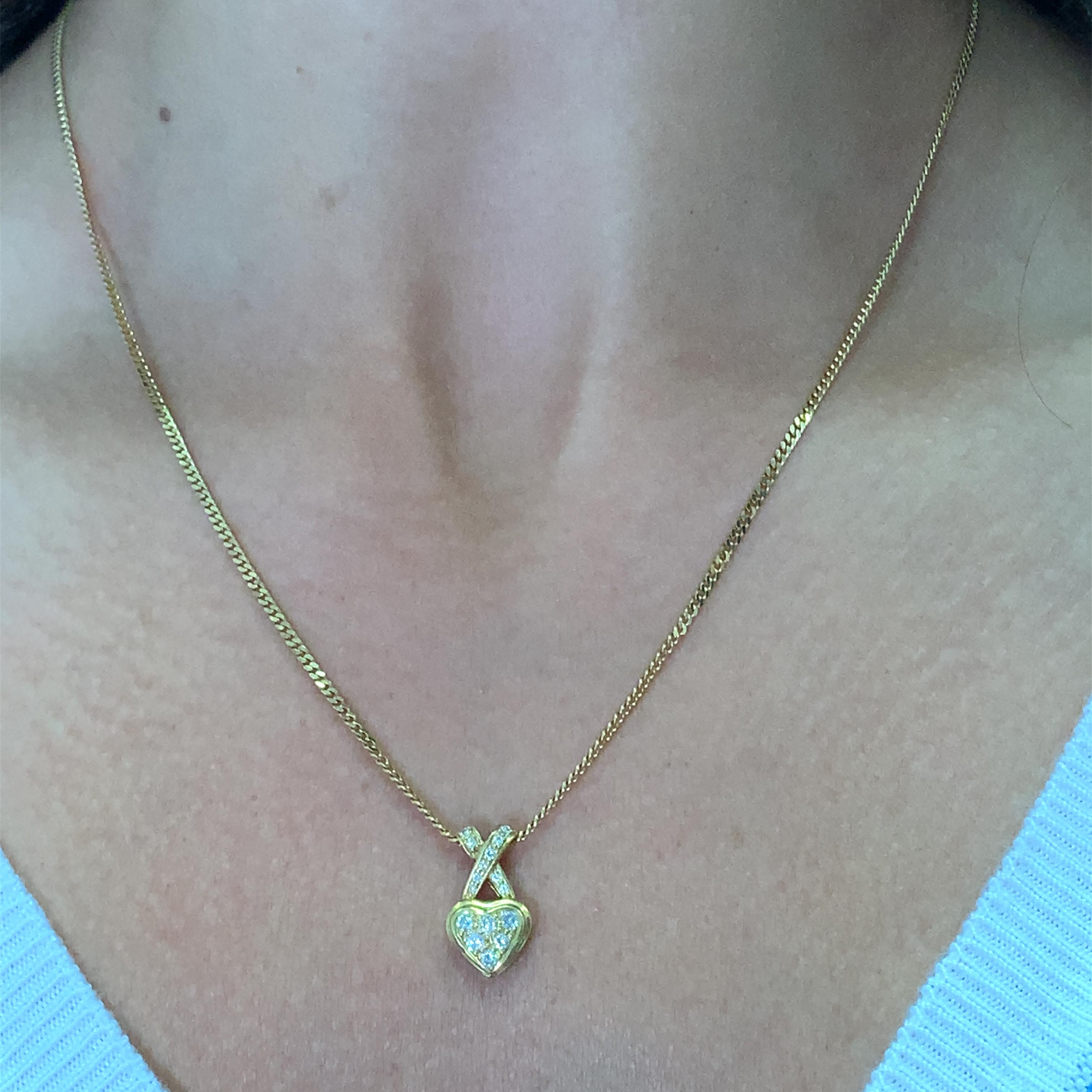 0.55ct Diamond heart cross pendant necklace in 18k yellow gold chain.
Diamond chunky 18ct yellow gold heart shaped pendant necklace
Diamond pave heart chunky pendant necklace in 18ct yellow gold, curb cuban link chain necklace.
Diamonds total weight