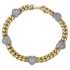 Bracelet en or avec chaîne en forme de cœur en diamants