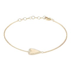 Bracelet en or 14K avec breloques en forme de coeur et diamants