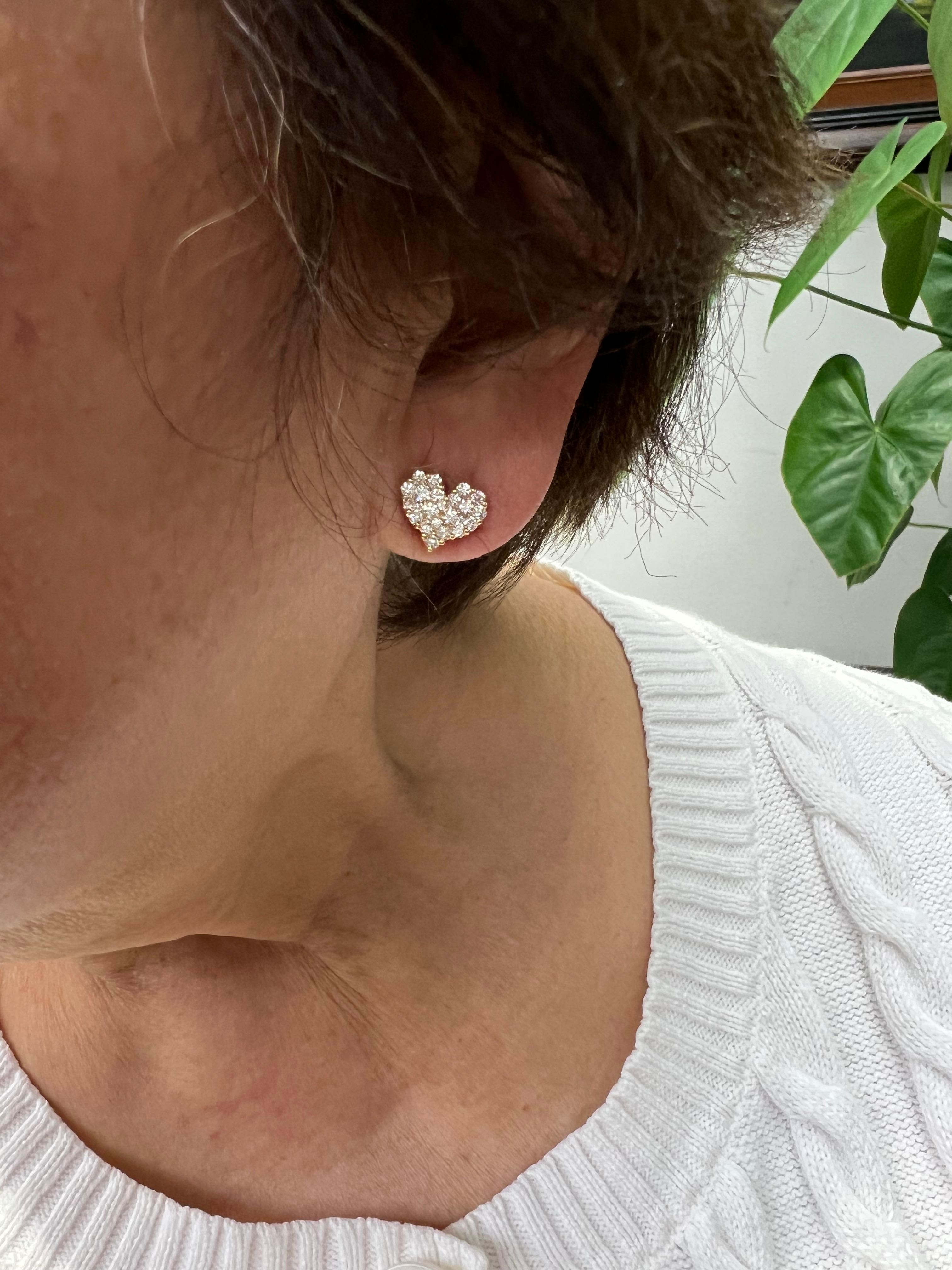 Diamond Heart Cluster 18k yellow gold stud earrings.

The Diamond Heart Cluster Stud Earrings made in 18k yellow gold are lovely made earrings.  Set throughout with round brilliant cut diamonds, they make their own statement.

SPECIFICATIONS:


