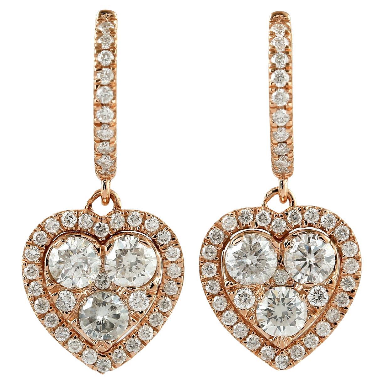 Orecchini pendenti con cuore di diamante in oro rosa 18 carati