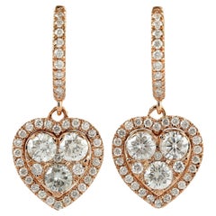 Orecchini pendenti con cuore di diamante in oro rosa 18 carati