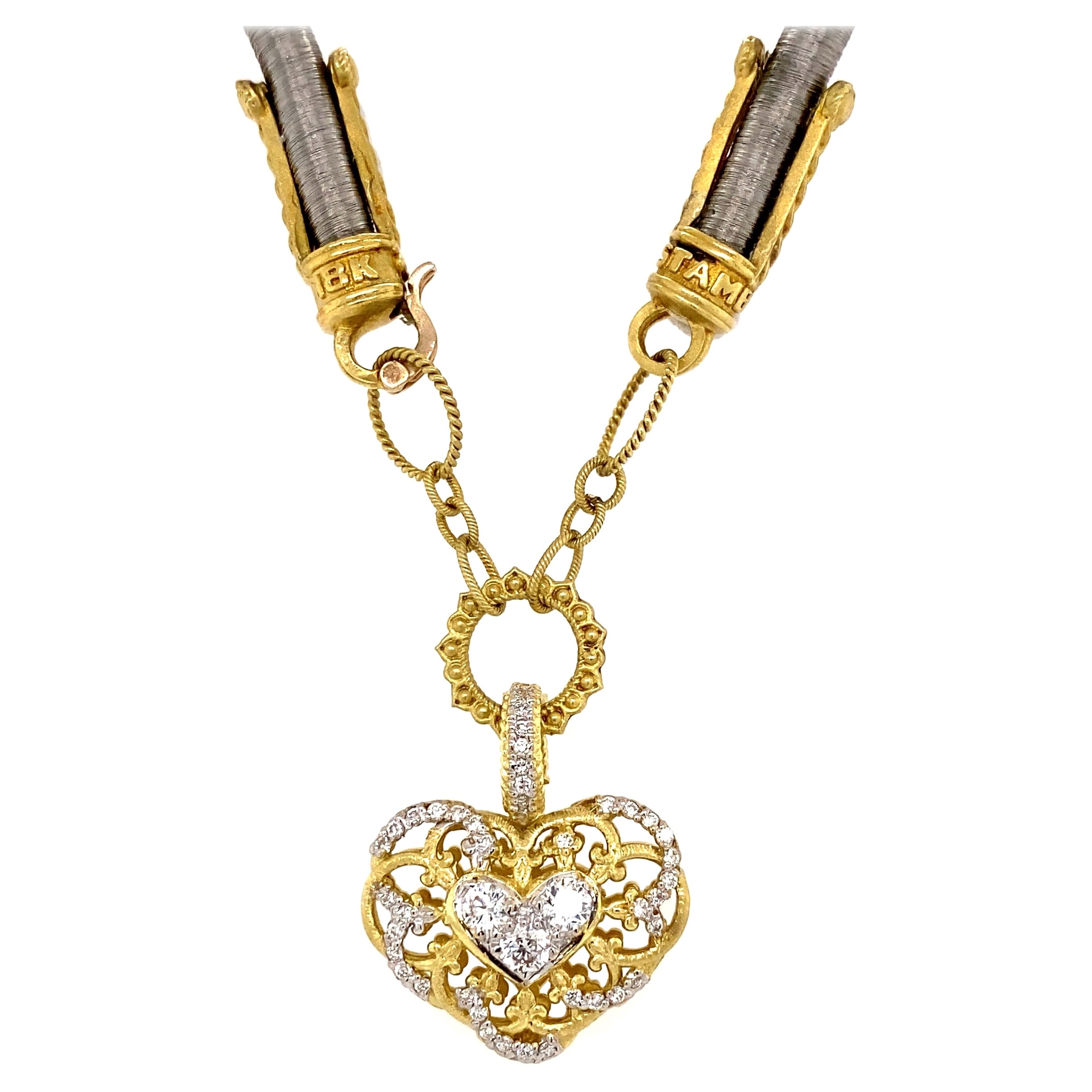 Collier pendentif Stambolien signé en or et acier inoxydable avec un cœur en diamant