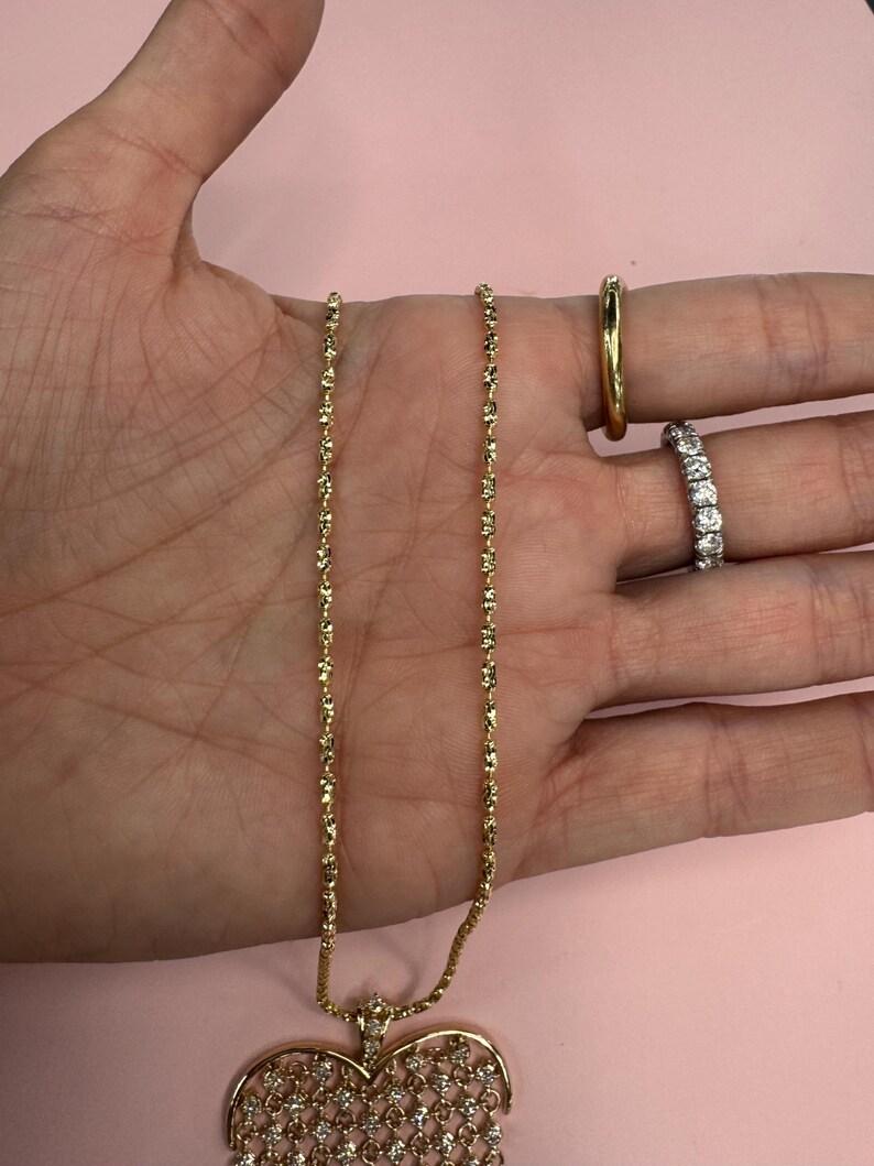 Collier avec pendentif en forme de coeur en diamant 1.43 carats Or jaune 14 carats 14.5 Grammes Pour femmes en vente