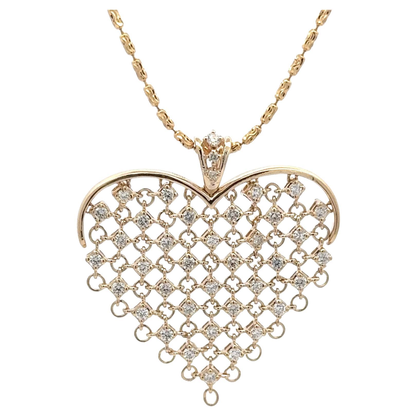 Collier avec pendentif en forme de coeur en diamant 1.43 carats Or jaune 14 carats 14.5 Grammes en vente
