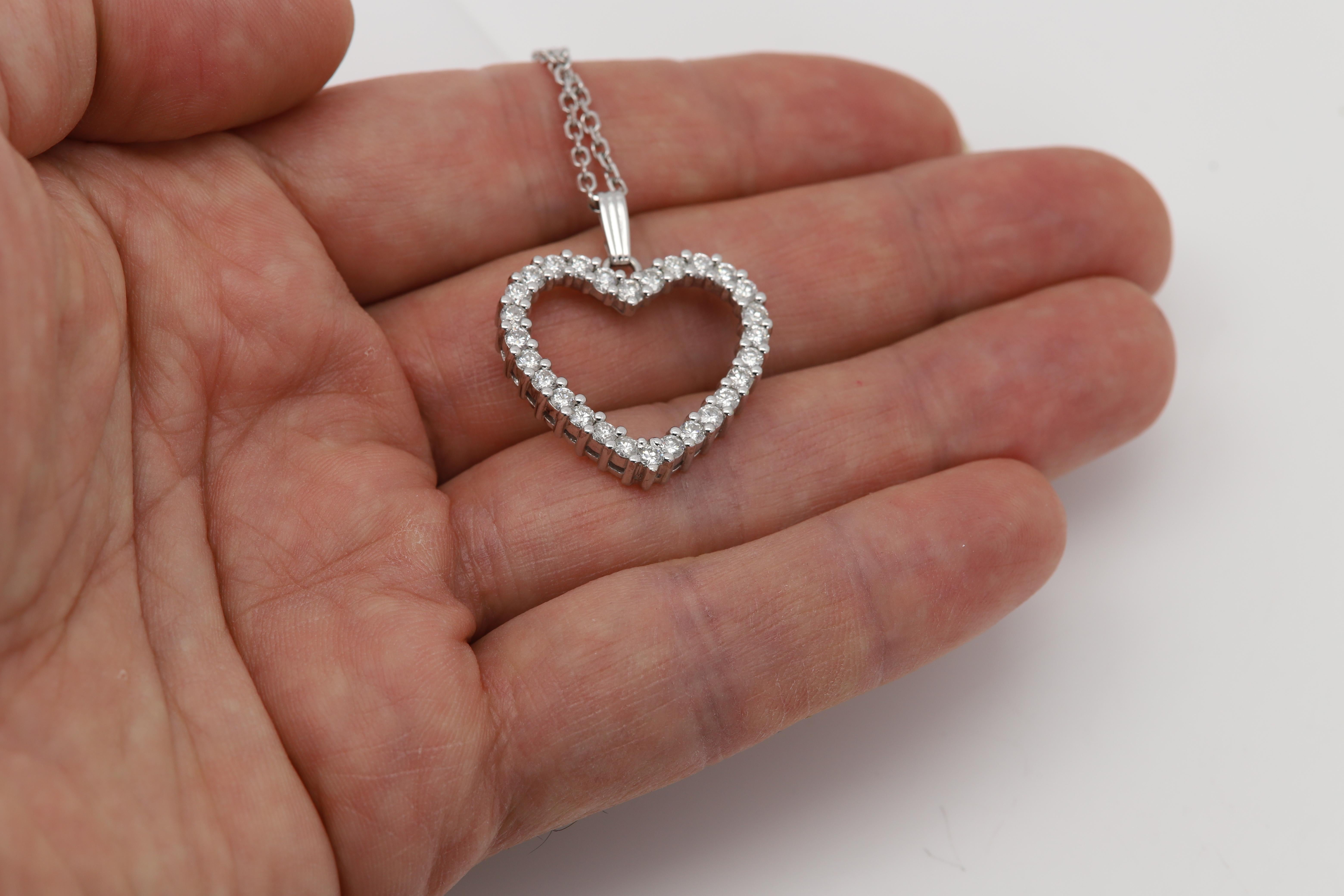 Perfect Heart Necklace Pendant
Diamonds all around Total 1.50 carat.
set in 14k white Gold Total weight 10.1grams
Chain is 20' Inch
The Diamonds are approx 2.5mm each stone in Color /Clarity of H-SI-I
overall nice brilliant to the eyes.
Heart Size