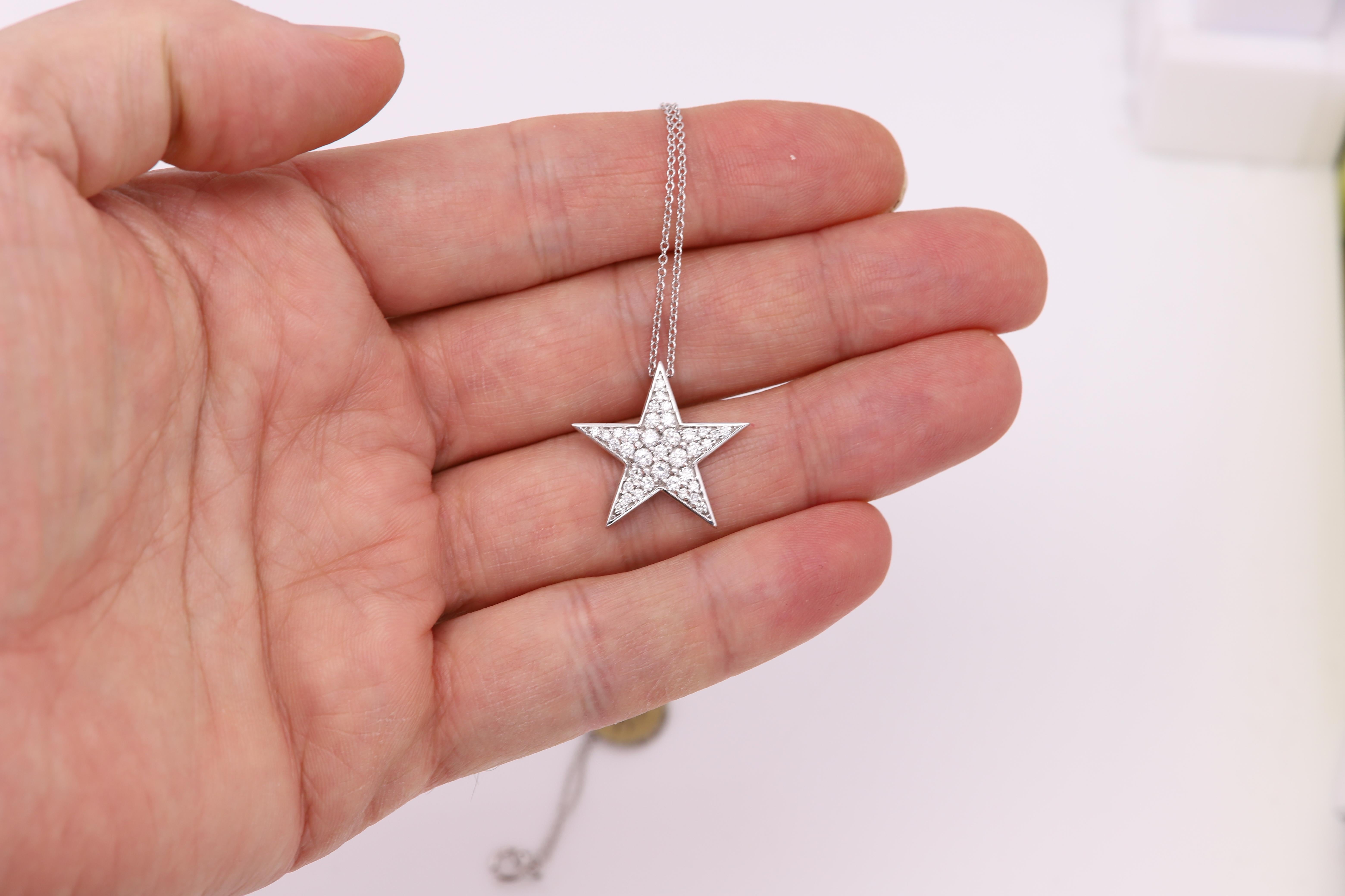 Perfect Star Diamond Necklace 
Cluster Diamonds approx Total 1.50 carat. G-VS
set in 14k white Gold Total weight 14.1grams
Chain is 18' Inch
Star Size approx 22 mm in diameter (a bit less from an Inch'
overall nice brilliant to the eyes.
+Gift