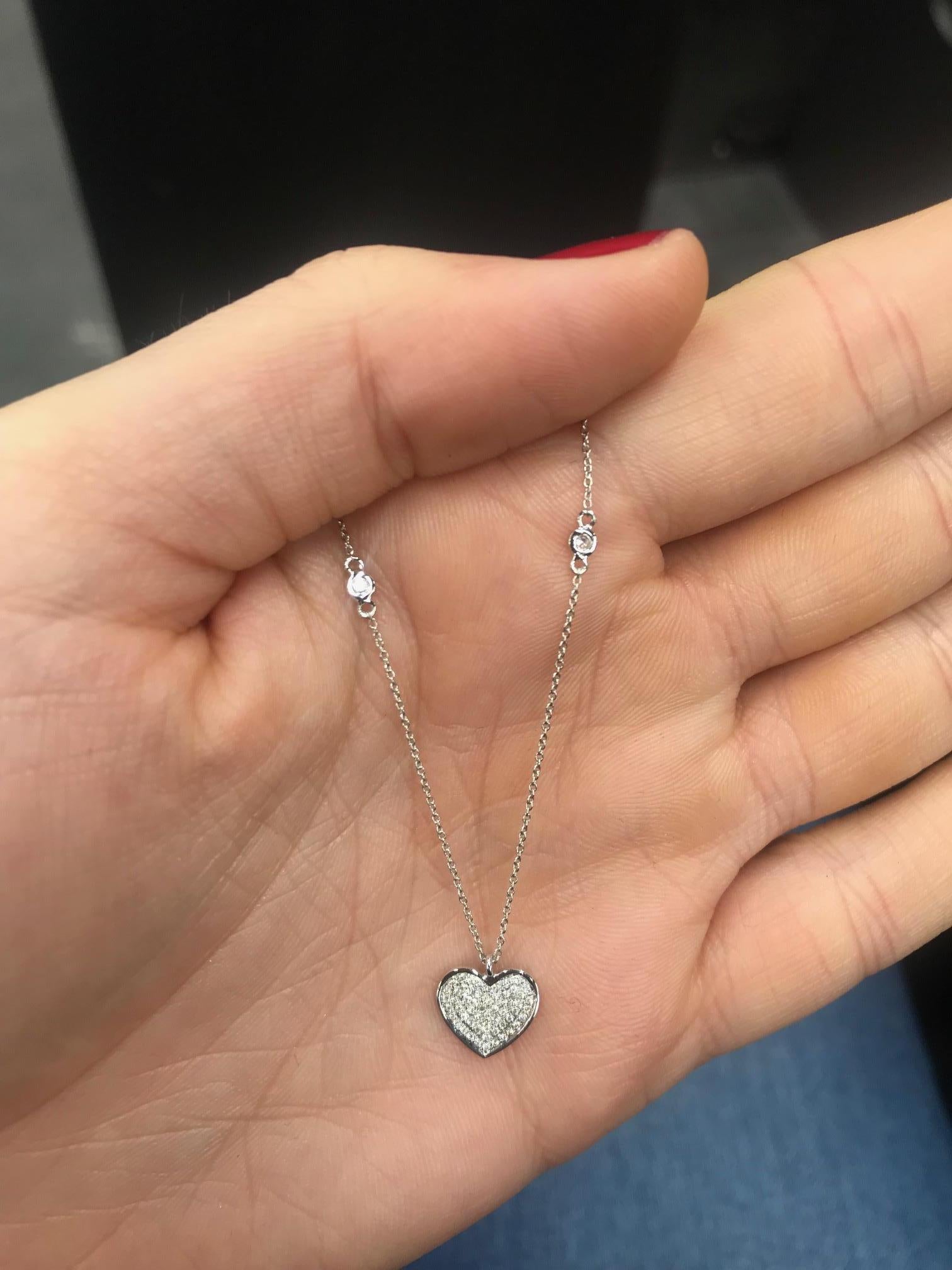 18K White gold necklace featuring one diamond heart weighing 0.10 carats.