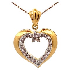 Collier en or jaune 18k avec cœur en diamant
