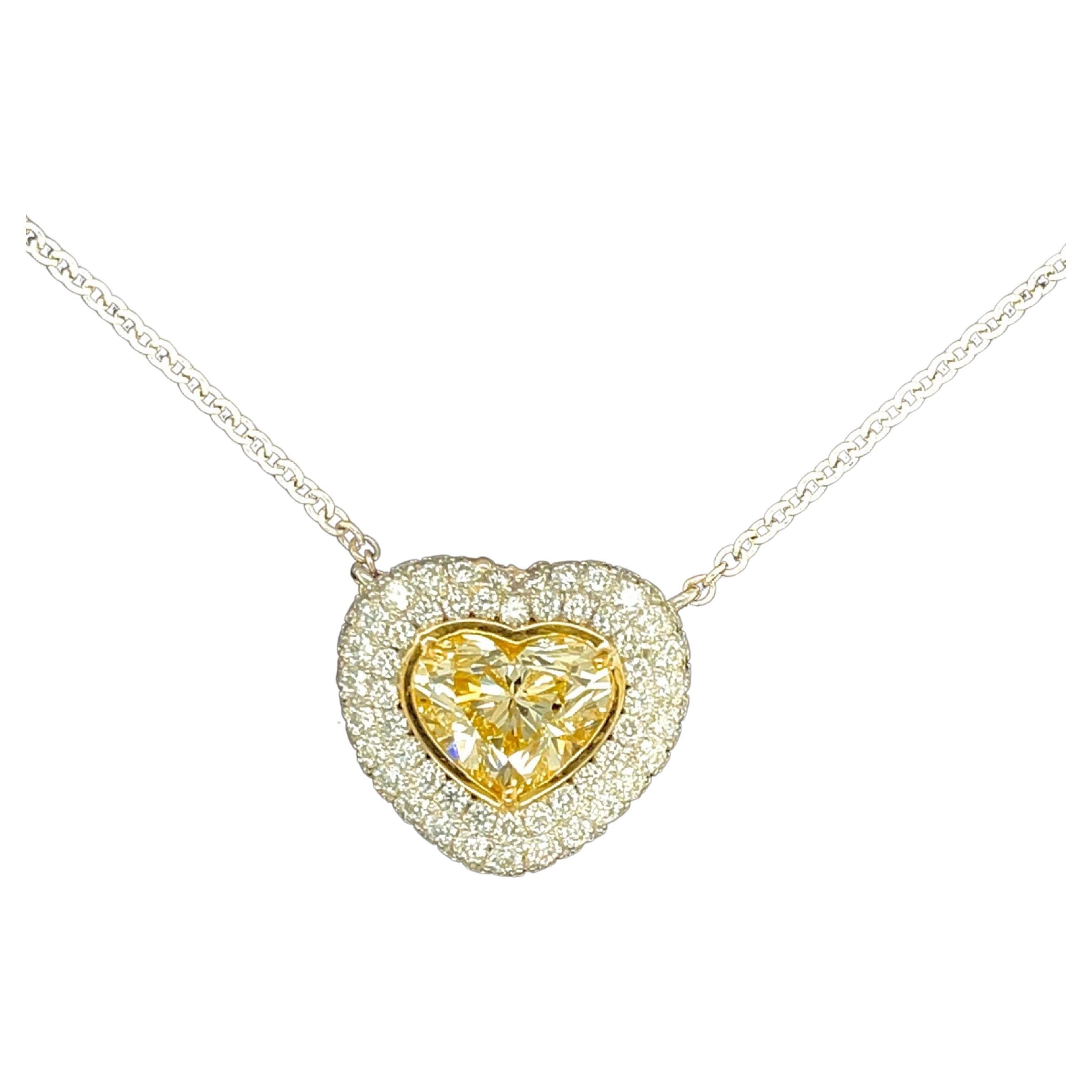 Heart Shape Yellow Diamond Pendant 2.50 carats Platinum/18KYG

Spectacular. Set in Platinum/18KYG

Stunning! Looks like nice FANCY YELLOW.

Heart Shape weighs 2.50 carats

W-X  Color VS2 Clarity

With GIA Certificate # 5212163136

Small Round
