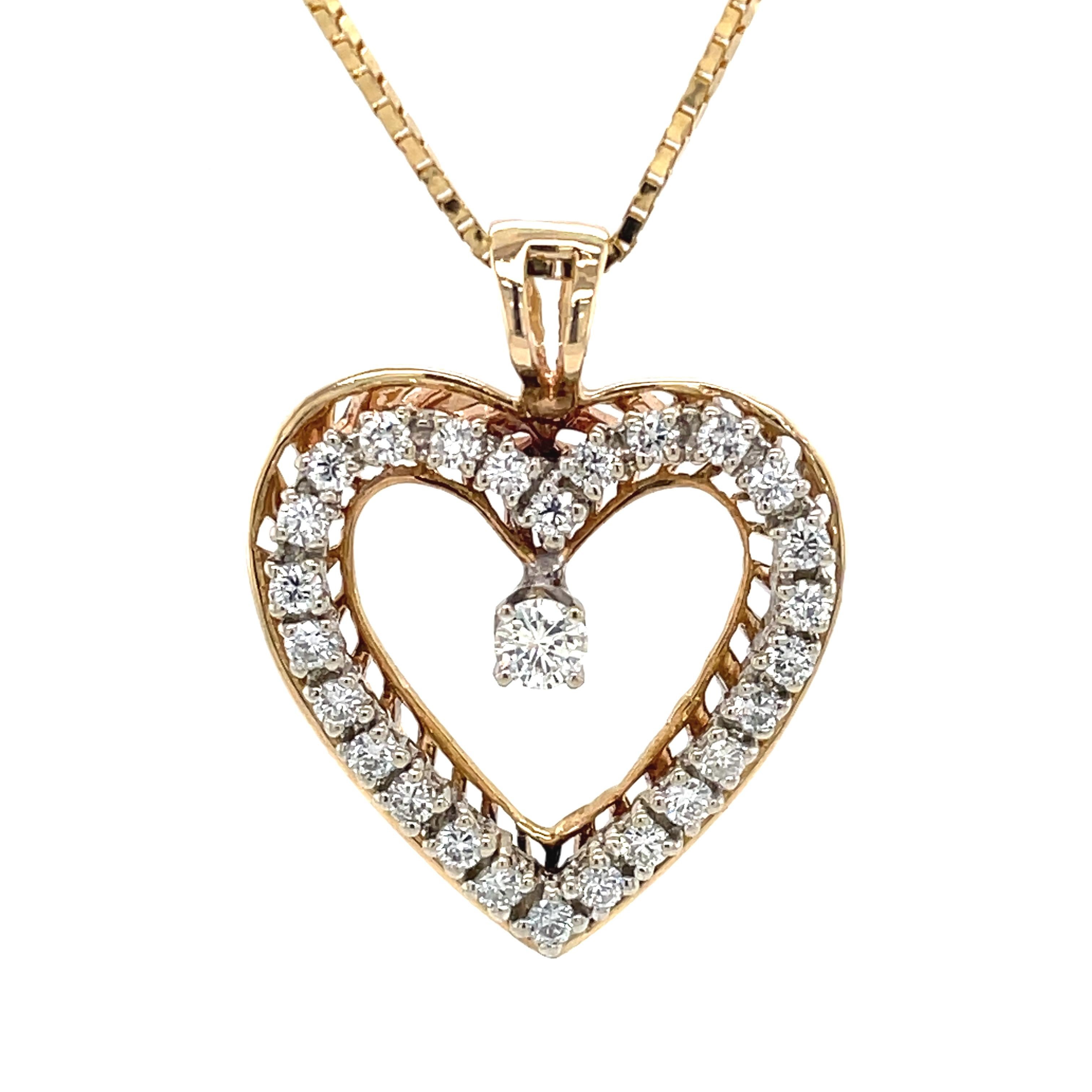 Show her your sentiment with this glistening diamond heart pendant necklace. Crafted of fourteen karat 14K yellow gold, the 7/8 inch x 1 inch open form heart pendant of this lovely necklace is lined with twenty-six sparkling .055 H/SI diamonds, plus