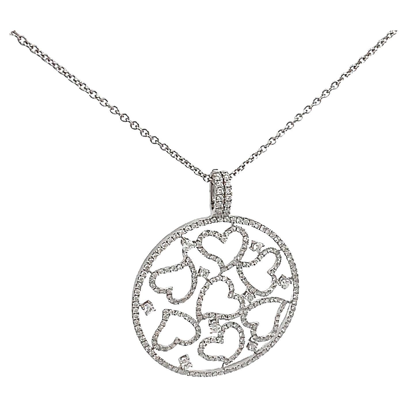 Ciondolo circolare con cuore di diamante