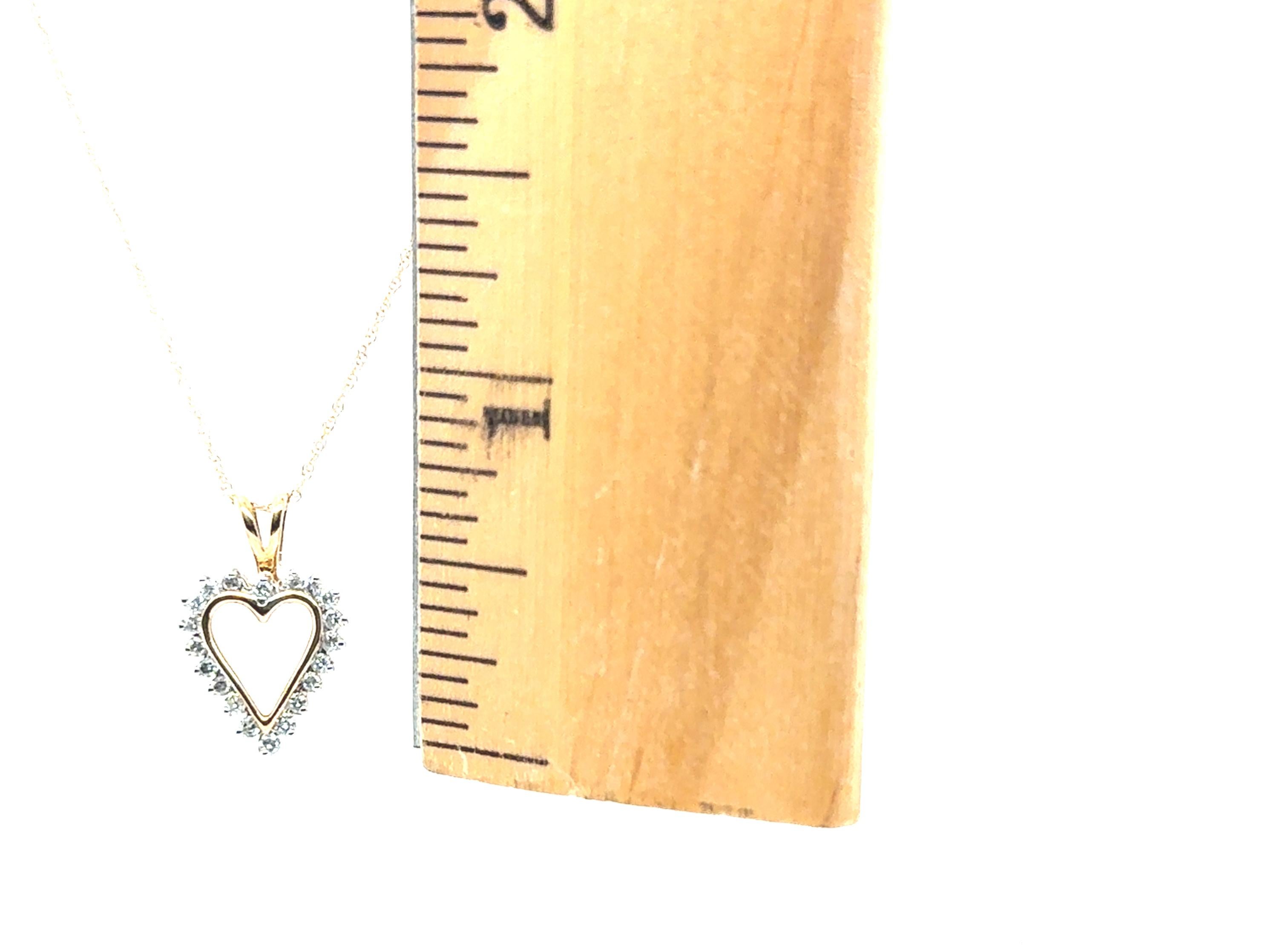 Collana con ciondolo a forma di cuore in oro giallo 14 carati con diamante naturale coniato da 0,25 ct. in vendita 1