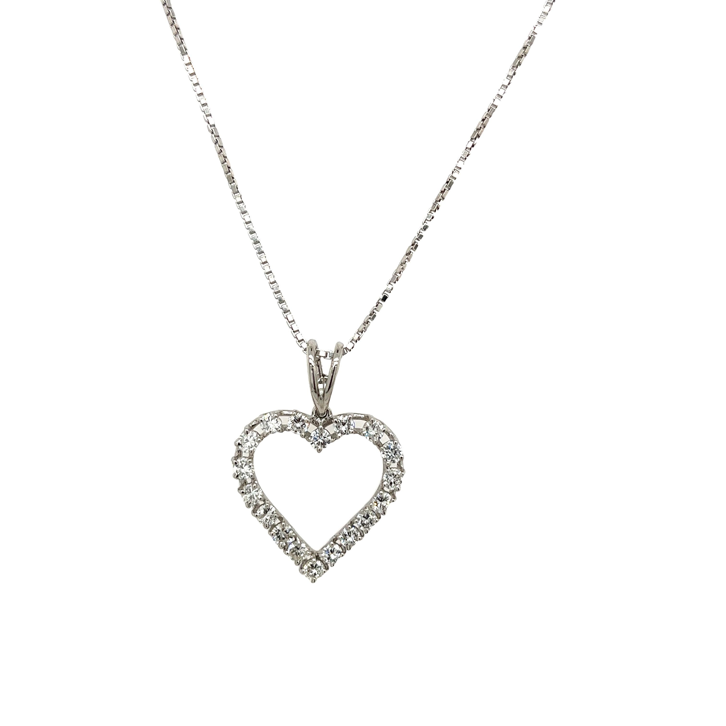 This gorgeous diamond heart pendant 
is set with with a total of 0.70 carats round brilliant cut diamonds in 18ct white gold. 
The pendant is suspended from a 18ct white gold chain 
Venetian style that measures 18 inches.
Chain Length: 18