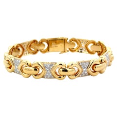 Bracelet sectionnel en or jaune 18 carats avec cœurs de diamants