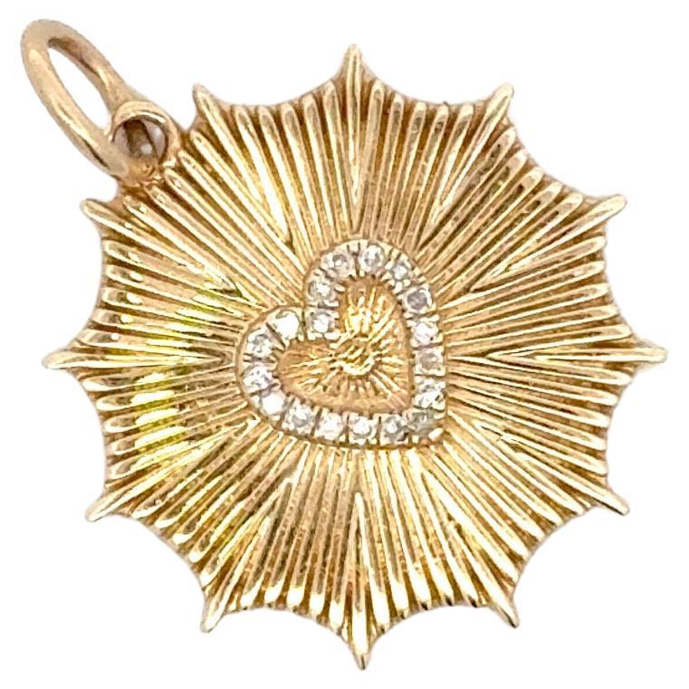 Made in Italy, this disc pendant features 18 diamonds weighing 0.07 carats with a sunray design. 
Necklace not included.
DM for different necklace options.
More heart pendants available.
Search Harbor Diamonds
