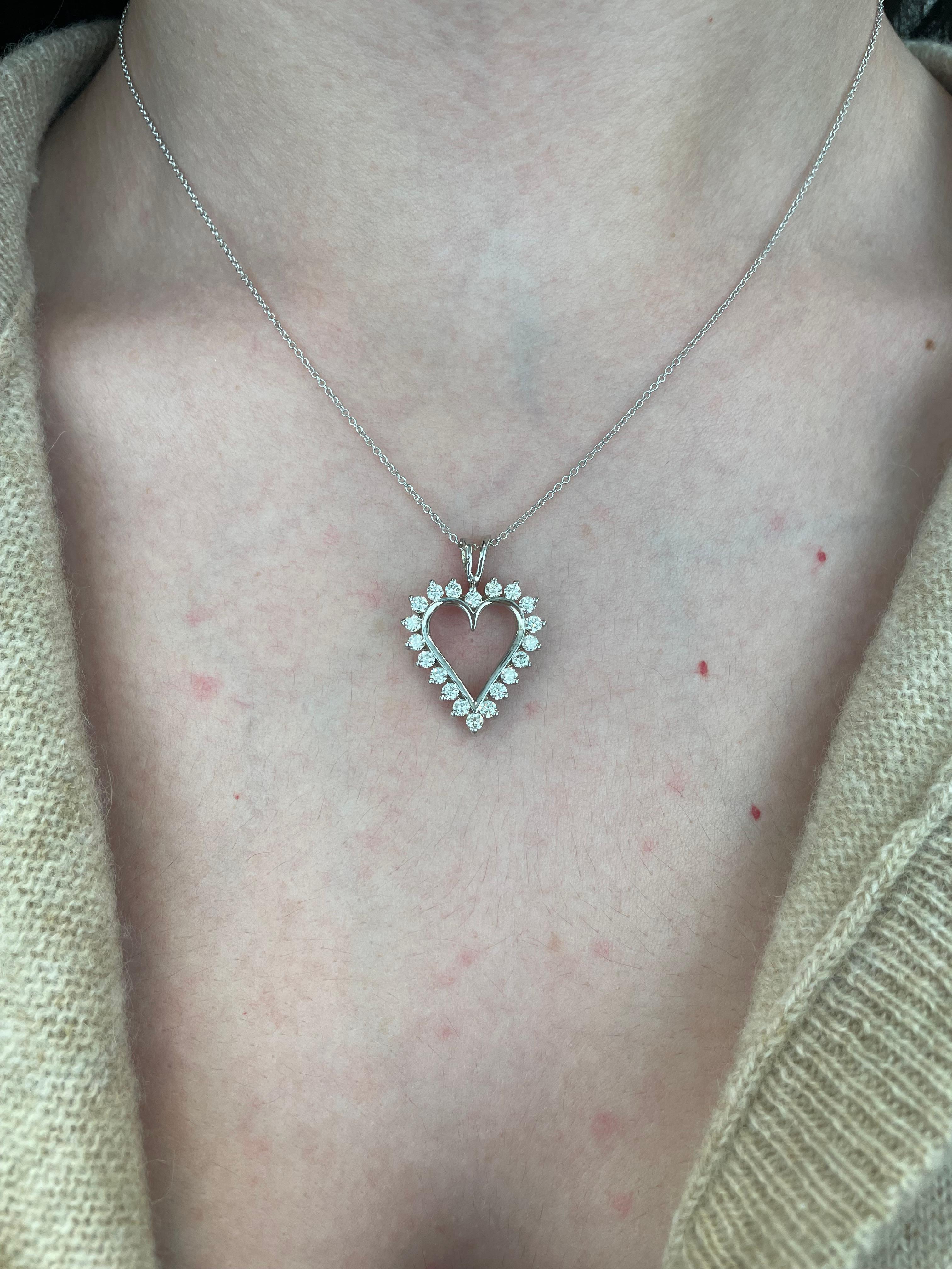 Lovely classic diamond heart pendant necklace.
20 round brilliant diamonds, 0.80 carats. Approximately I/J color and SI clarity. 14-karat white gold, 16 inches.
Accommodated with an up-to-date digital appraisal by a GIA G.G. once purchased, upon