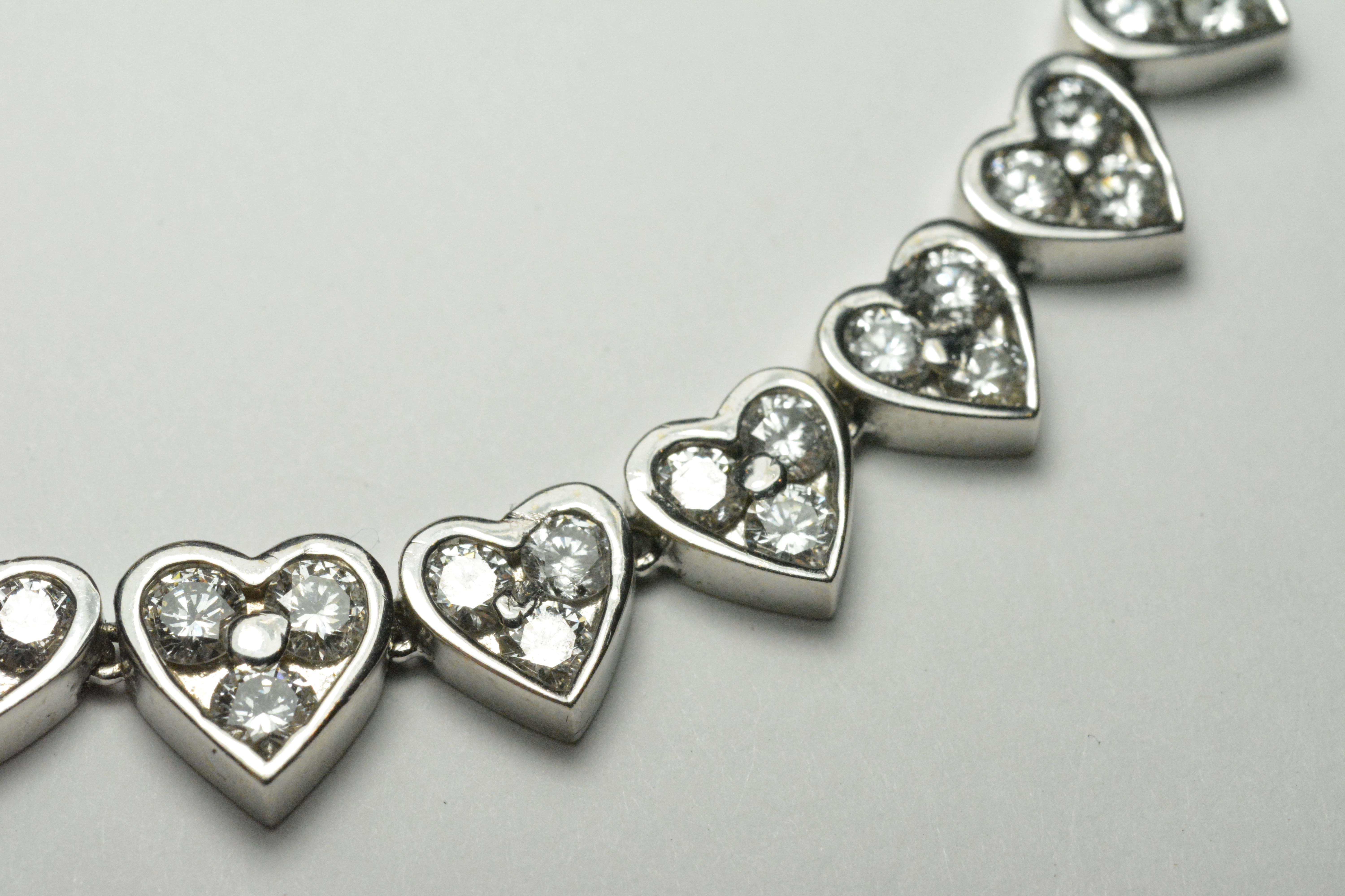 Round Cut Diamond Hearts Necklace in 18 Karat White Gold with Total Carat Weight of 9.00