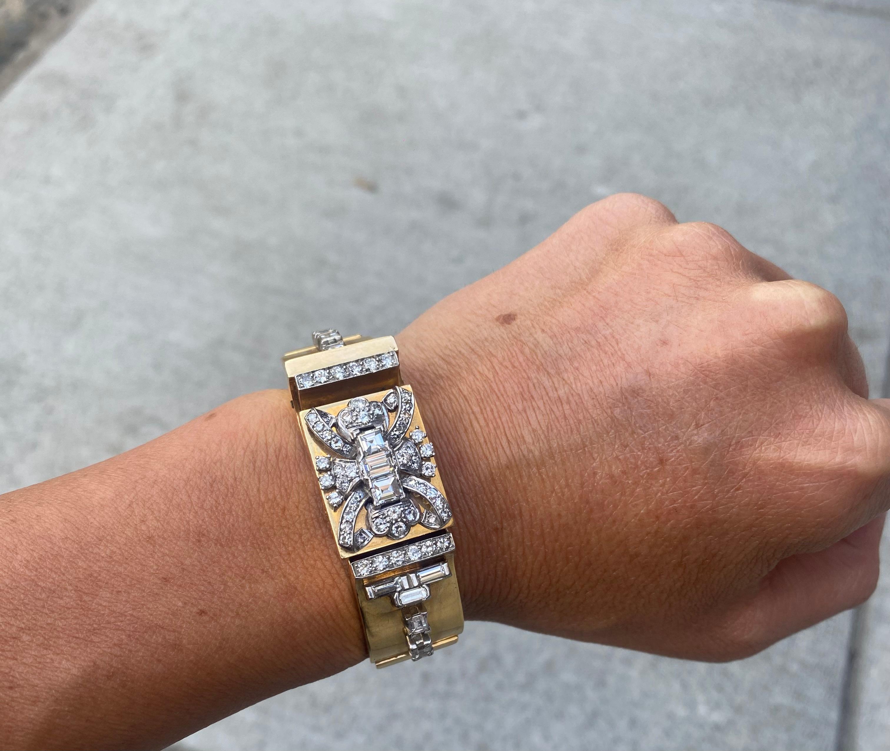 Diamond Hidden Watch.

A square-faced watch adorned with baguette and round-cut diamonds weighing approximately 5.55 carats 

Measurements: 7