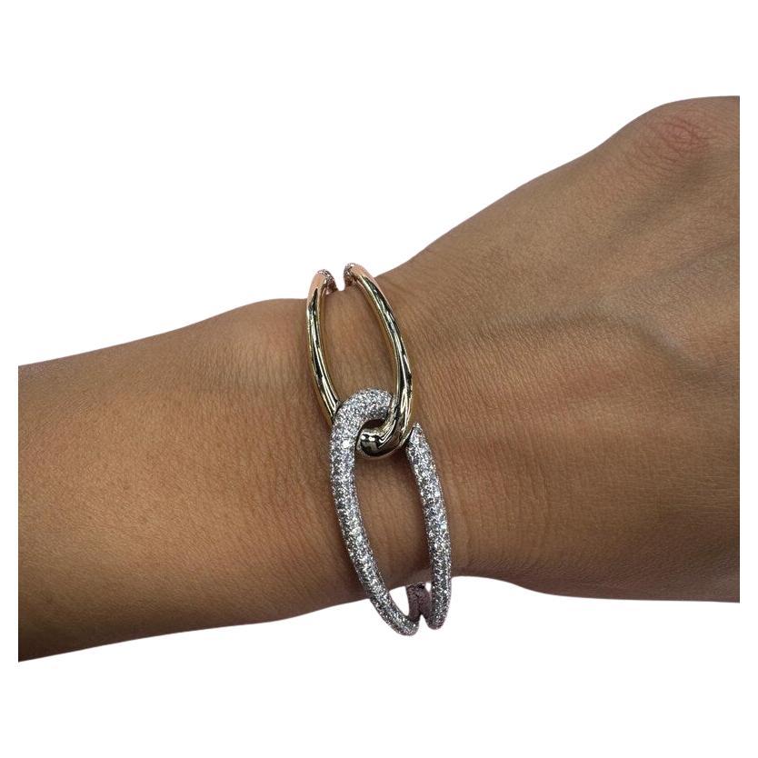 Pulsera de nudo calado de oro amarillo de 14 quilates con 286 brillantes redondos de 3,80 quilates y un peso de 17,81 gramos. 

Color I
Claridad VS2

Más brazaletes disponibles 
Buscar en Harbor Diamonds
Mensaje para más fotos e información. 