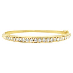 Bracciale a cerniera con diamanti in oro giallo 18 carati