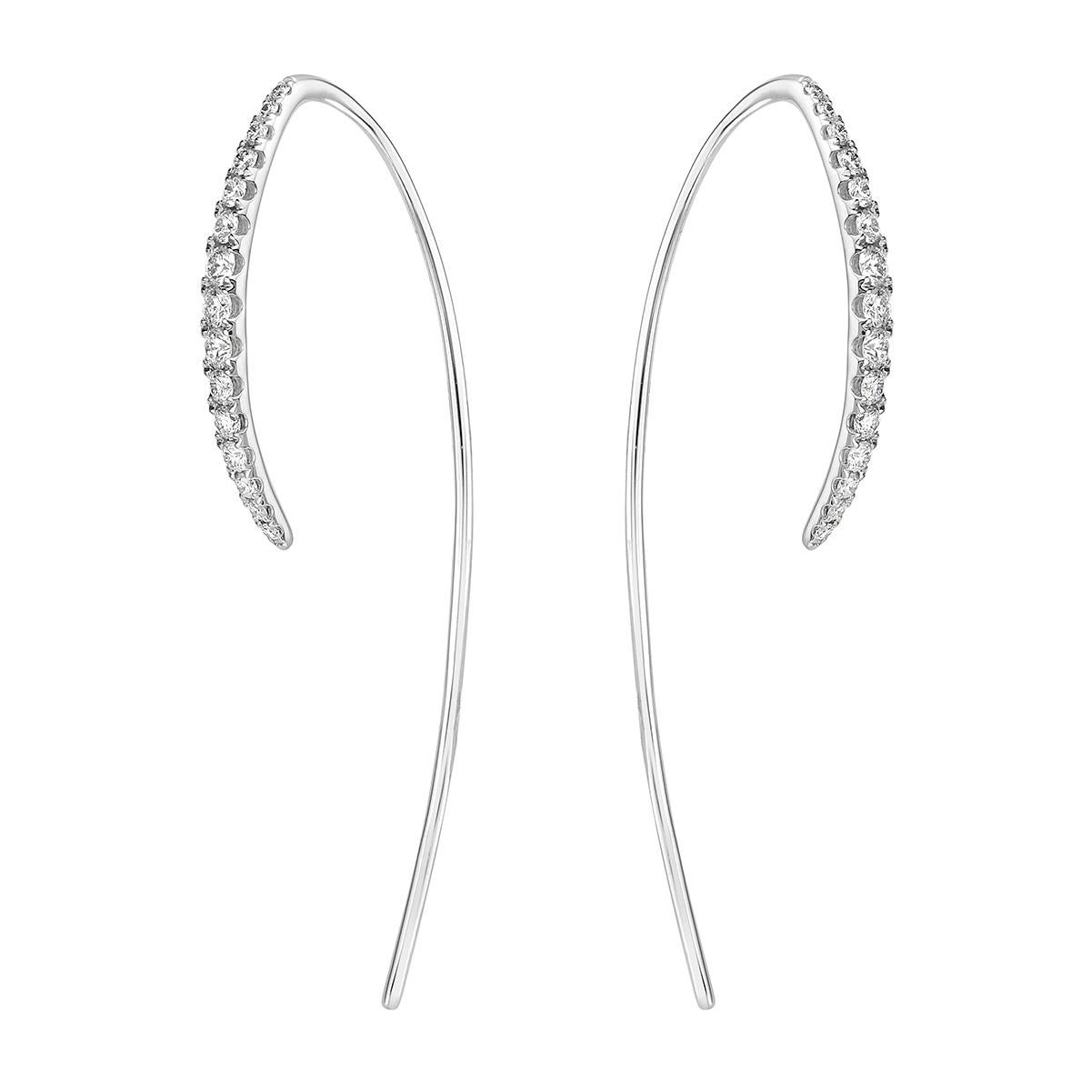 With these exquisite white-gold diamond hook earrings, style and glamour are in the spotlight. These earrings are set in 18-karat gold, made out of 3.4 grams of gold. The color of the diamonds is G. The clarity is VS2. These earrings are made out of