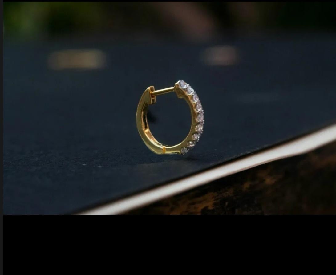 Diamant-Creolen-Ohrring 14k Massivgold 10mm Diamant Huggie-Ohrringe Paar

Material
14k Massiv Gold
Metall
Gelbgold
Karat Gesamtgewicht
0,24 ctw und darunter
Zertifizierung
IGI
Hauptstein
Diamant
Metallische Reinheit
14k
Metallkern
Gelbgold


A P P R