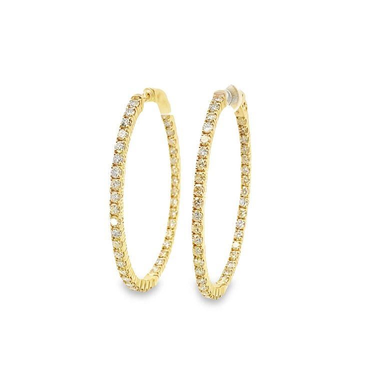 The name says it all. A pair of hoops that feature a total of 4.36 carats of oval -cut diamonds. These are white diamonds that are perfectly crafted in 14K yellow gold, with an inside-and-out design that is perfect for everyday wear. The diamonds